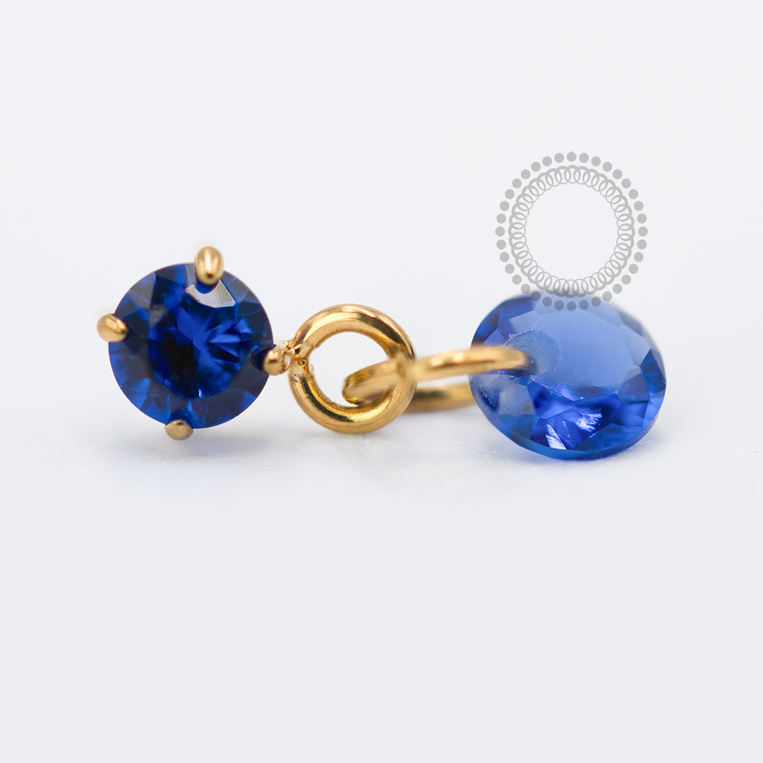 TN1712 Topo Ponto De Luz Azul Safira Com Pingente Cristal Push Pin Titânio PVD Gold