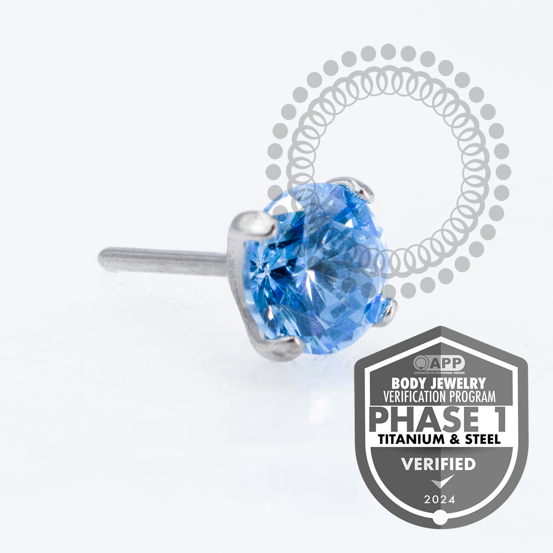 TT07 Topo CZ Blue Prongset Push Pin Titânio Mill®