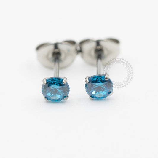 TN637-3  Brincos Zirconia Azul 4mm Titânio