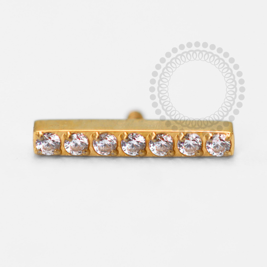 TN1431 Bar Top 7 Zirconias Titanium PVD Gold 