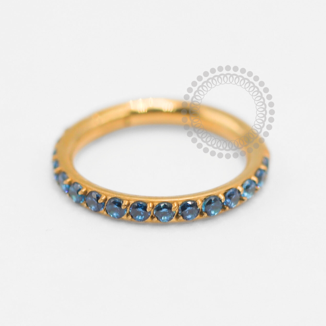 TN1906 Segmento Zircônia Azul Safira Titânio PVD Gold